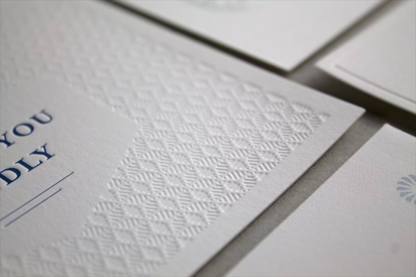 Frost Bank embossed paper